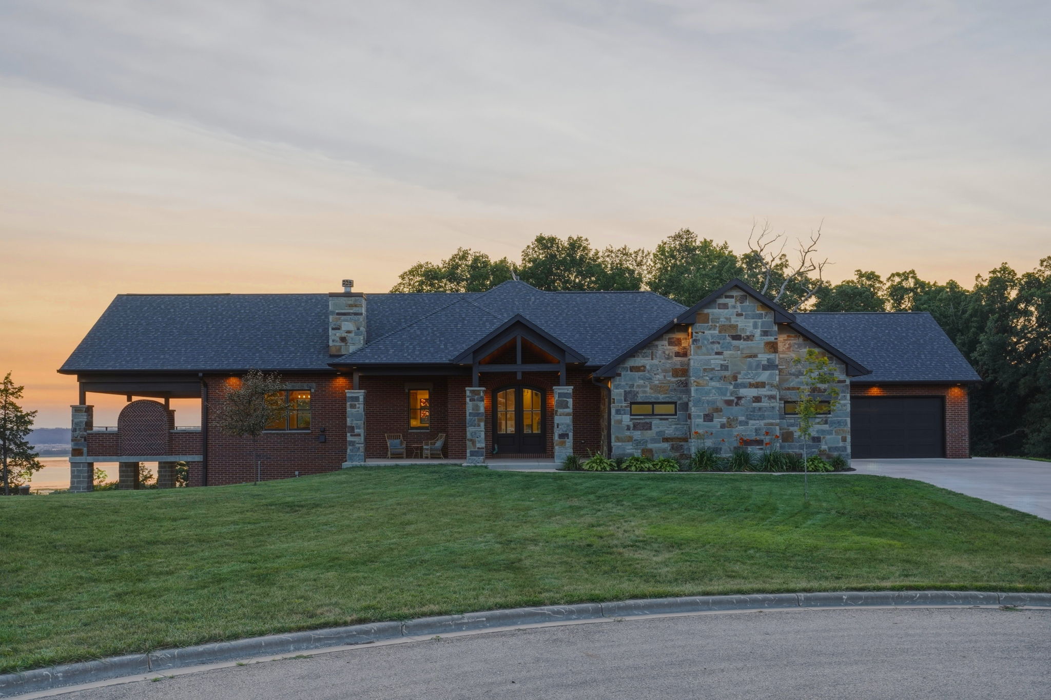 Twilight, drone and virtual staging for a bluff-top home in Hazel Green